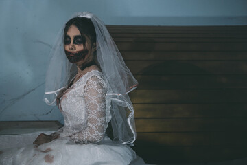 Portrait of asian woman make up ghost bride death and blood the horror is darkness scary horror...