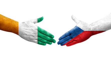 Handshake between Czechia and Ivory Coast flags painted on hands, isolated transparent image.