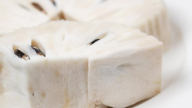  soursop fruit on a plate on table 