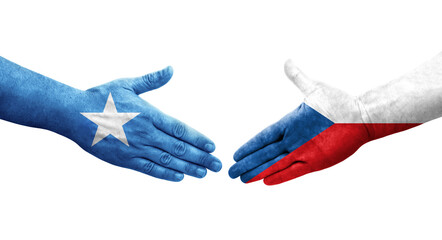Handshake between Czechia and Somalia flags painted on hands, isolated transparent image.