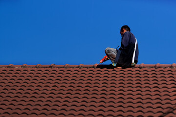tile roofing contractor Seal the roof leaks with silicone sealant.