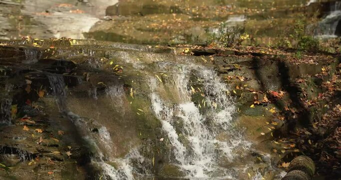 Autumn video of a scenic waterfall located in Lansing NY, Emilie Jonas Nature Falls Trail, near Ithaca, New York.	