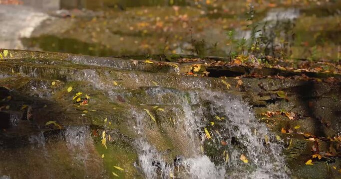 Autumn video of a scenic waterfall located in Lansing NY, Emilie Jonas Nature Falls Trail, near Ithaca, New York.	