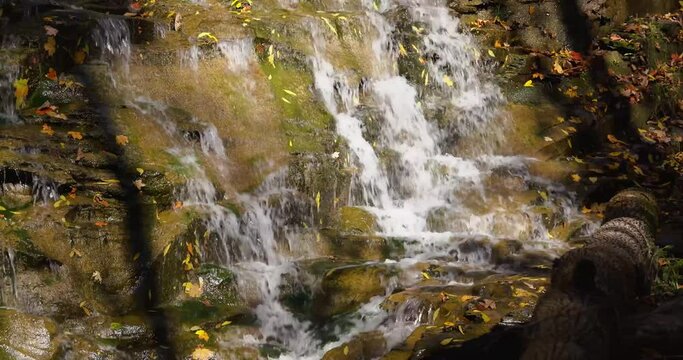 Autumn video of a scenic waterfall located in Lansing NY, Emilie Jonas Nature Falls Trail, near Ithaca, New York.	