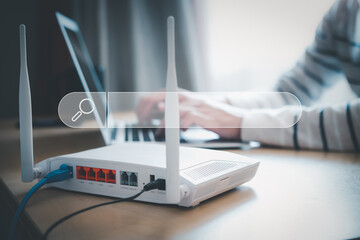 Selective focus at the search box with blurred background of men hand holding digital tablet or...