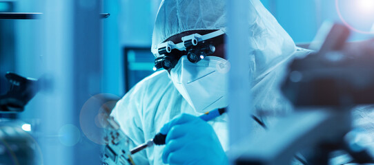 African-American scientist works in a modern scientific laboratory for the research and development...