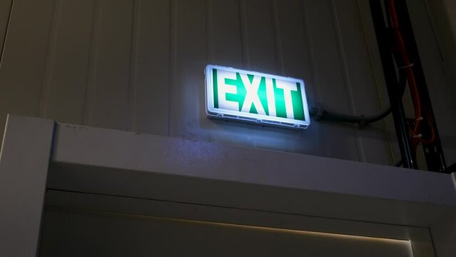 emergency exit sign on the door