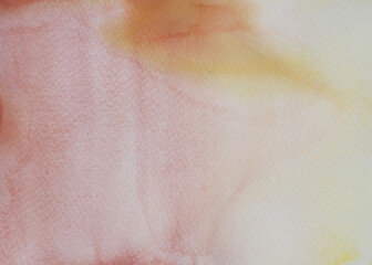 Watercolor stroke and spray on white paper , Abstract background by hand drawn yellow with orange and red color liquid drip