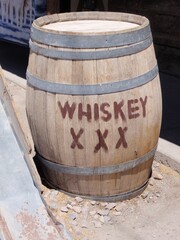 Fototapeta premium Wooden Whiskey Barrel Outside in Oatman, Arizona 