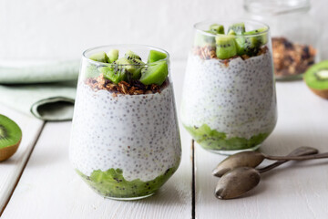 Chia pudding with kiwi and granola. Healthy eating. Vegetarian food. Breakfast.