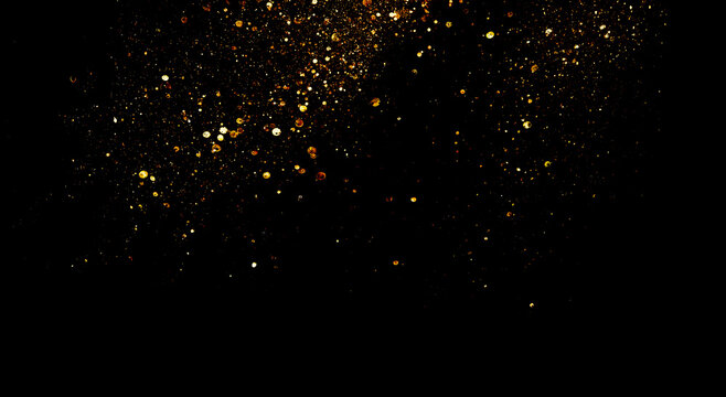 glitter vintage lights background. gold and black. de focused