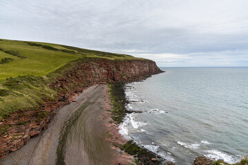 Fototapeta na wymiar the Cumbria coastline and the cliffs of the St Bees headland