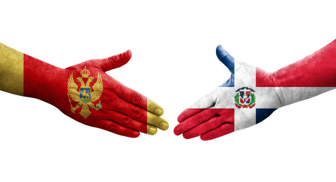 Handshake between Dominican Republic and Montenegro flags painted on hands, isolated transparent image.