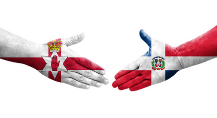 Handshake between Dominican Republic and Northern Ireland flags painted on hands, isolated transparent image.