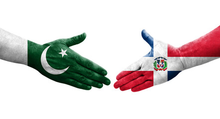 Handshake between Dominican Republic and Pakistan flags painted on hands, isolated transparent image.