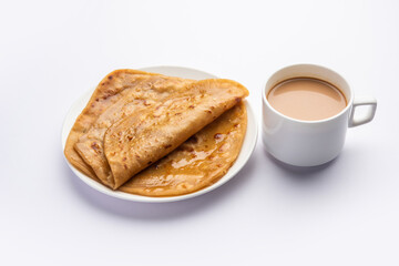 Chai Paratha - Hot Tea served with Flatbread is a traditional simple meal from India and Pakistan