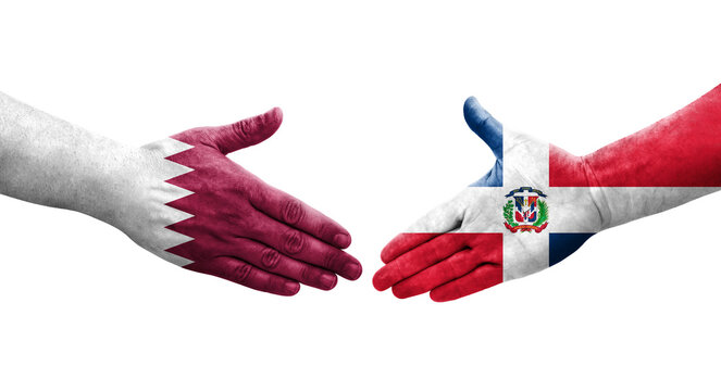 Handshake between Dominican Republic and Qatar flags painted on hands, isolated transparent image.