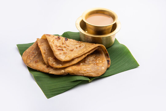Chai Paratha - Hot Tea served with Flatbread is a traditional simple meal from India and Pakistan