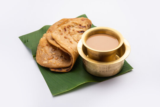 Chai Paratha - Hot Tea served with Flatbread is a traditional simple meal from India and Pakistan
