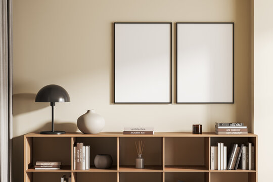 Bright living room interior with two empty white posters