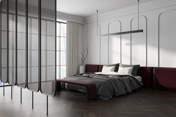 Stylish bedroom interior with bed and partition, panoramic window