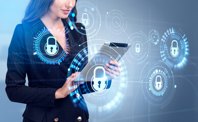 Businesswoman with tablet in hands, cybersecurity hud and data protection