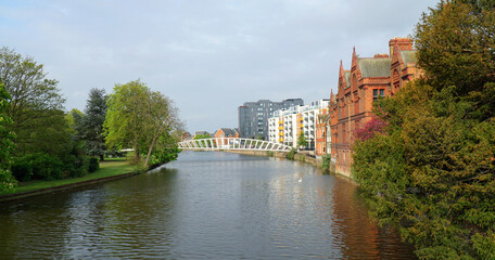 New buildings and bridge across the river Great Ouse at Bedford UK.	