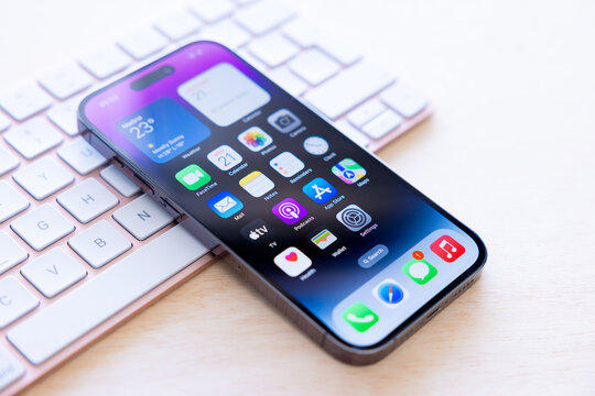 Madrid, Spain - September 21, 2022: Newly released iPhone 14 Pro mobile phone on computer keyboard