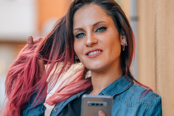 woman on the street with mobile phone