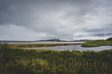 Inland walk to Dunstanburgh Castle which crosses some of the most beautiful stretches of Northumberland coastline