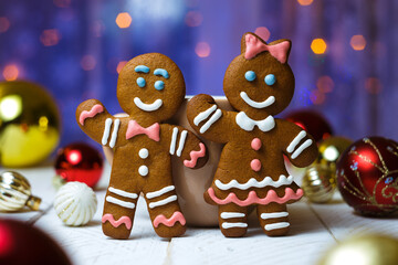 Christmas homemade gingerbread man cookies. Funny gingerbread couple. Happy New Year festive background