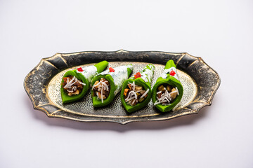 Kaju Gulkand Paan Mithai barfi - Indian sweet or dessert served in a plate