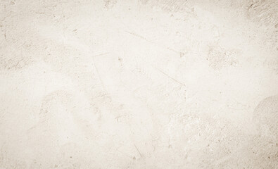 Old concrete wall texture background. Close up retro plain beige color cement material surface rough element concept.
