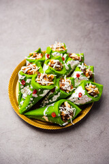 Kaju Gulkand Paan Mithai barfi - Indian sweet or dessert served in a plate