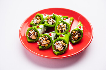 Kaju Gulkand Paan Mithai barfi - Indian sweet or dessert served in a plate