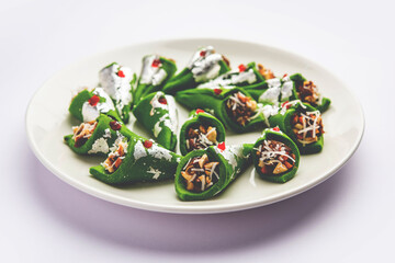 Kaju Gulkand Paan Mithai barfi - Indian sweet or dessert served in a plate