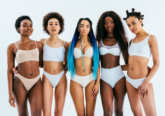 Black african beautiful women wearing underwear lingerie posing in studio for beauty, skin care,...