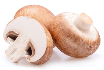 Brown cap champignons with slice of champignon mushroom isolated on white background. Close-up.