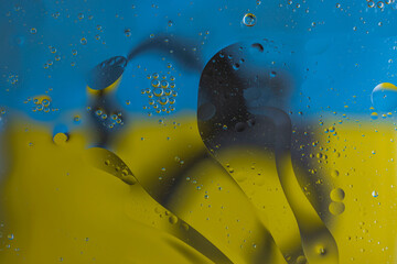 Close up view of yellow blue abstract texture and handcuffed underwater.