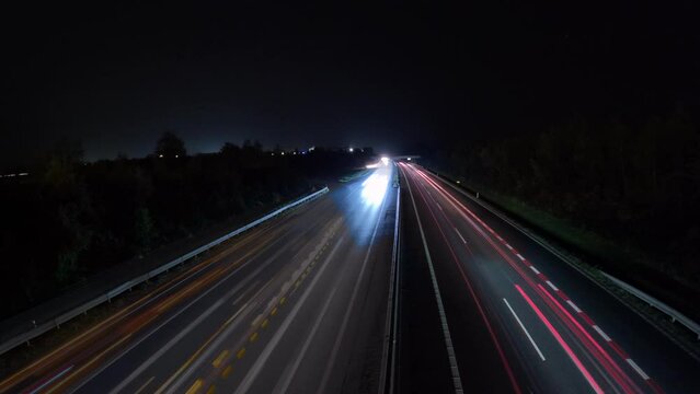 highway time lapse night lights-Fast moving traffic light trails,Light trails, Time lapse photography,Long exposure light trails,Light trail of moving traffic, vehicle at night, automobile lapse