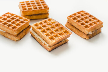 Confectionery products. Waffles on a white background. Soft waffles on a white background.