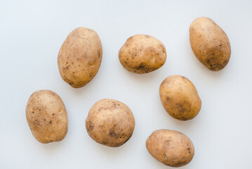 Potato on a white background. Potato tubers.
