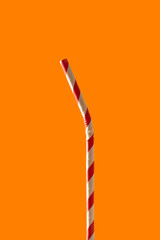 paper straw, single use, with orange background

