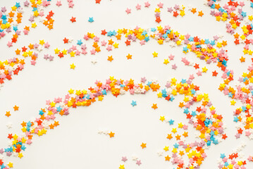 Colored sprinkling on a white background. Color background.