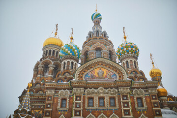 Fototapeta premium Scenic view of Savior on the Spilled Blood Church on snowy winter day in Saint Petersburg, Russia