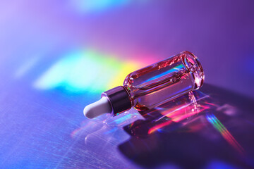 Cosmetic product bottle with iridescent highlights on holographic background. Skincare beauty...