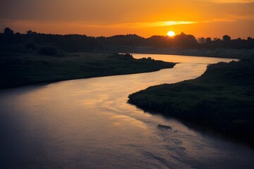 Obraz premium A beautiful and tranquil sunset over a river. 