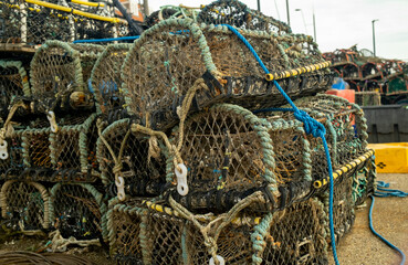 Crab pots, lobster pots and fish traps on the quaside in the seasidde town of Whitby, North Yorkshire