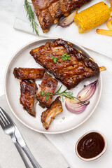 Spare ribs Grilled pork ribs with barbecue sauce and ketchup and grilled vegetables