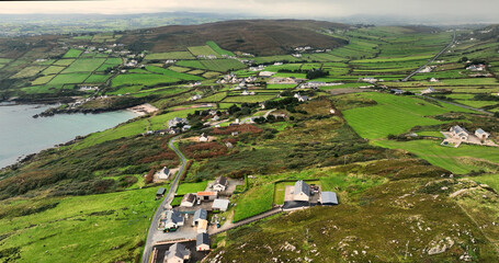 Aerial Photo of Rural Houses and Headland Wild Atlantic Way on the Atlantic Ocean Donegal Coast Ireland